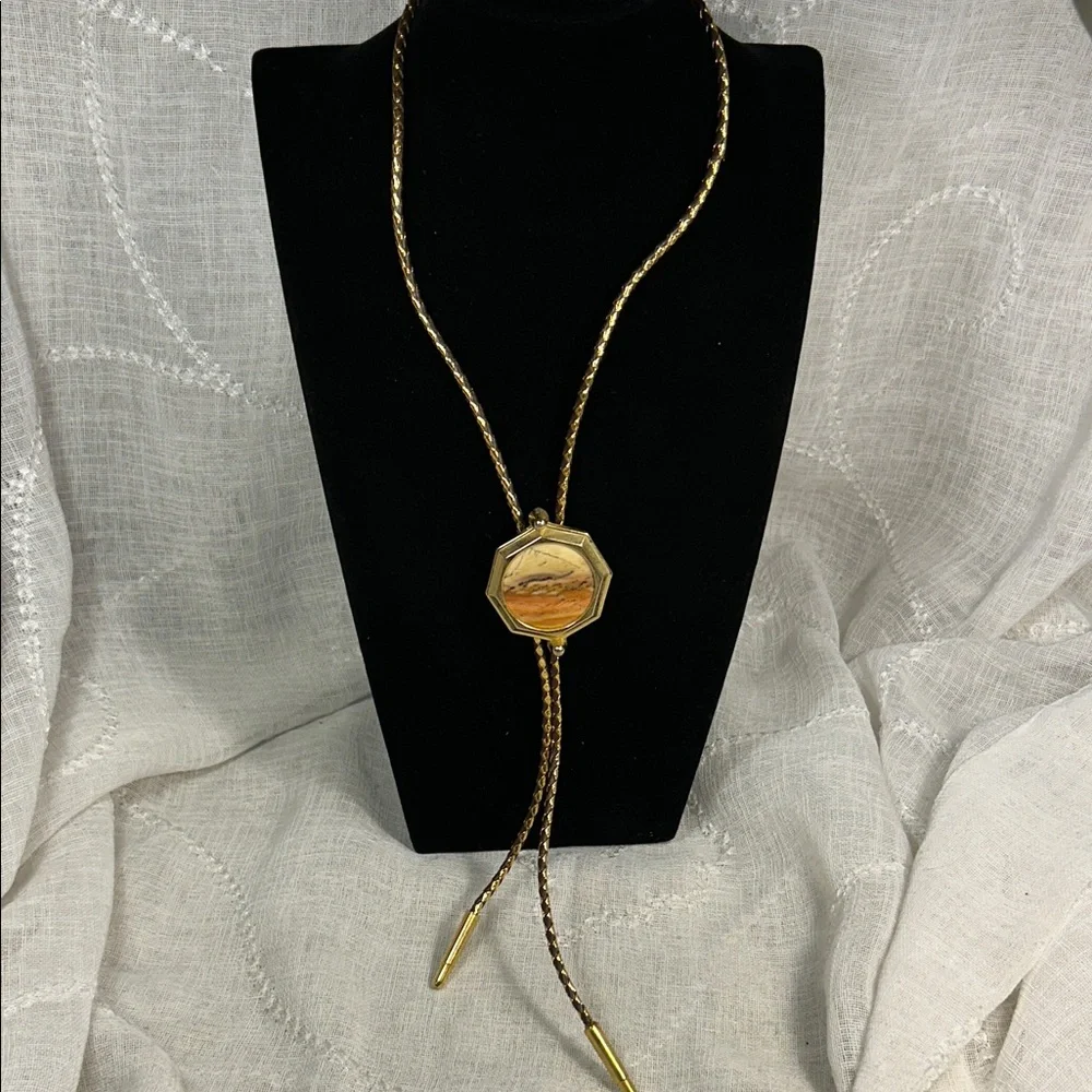 Vintage Bolo tie western leather, with ornate medallion, space for silver dollar
